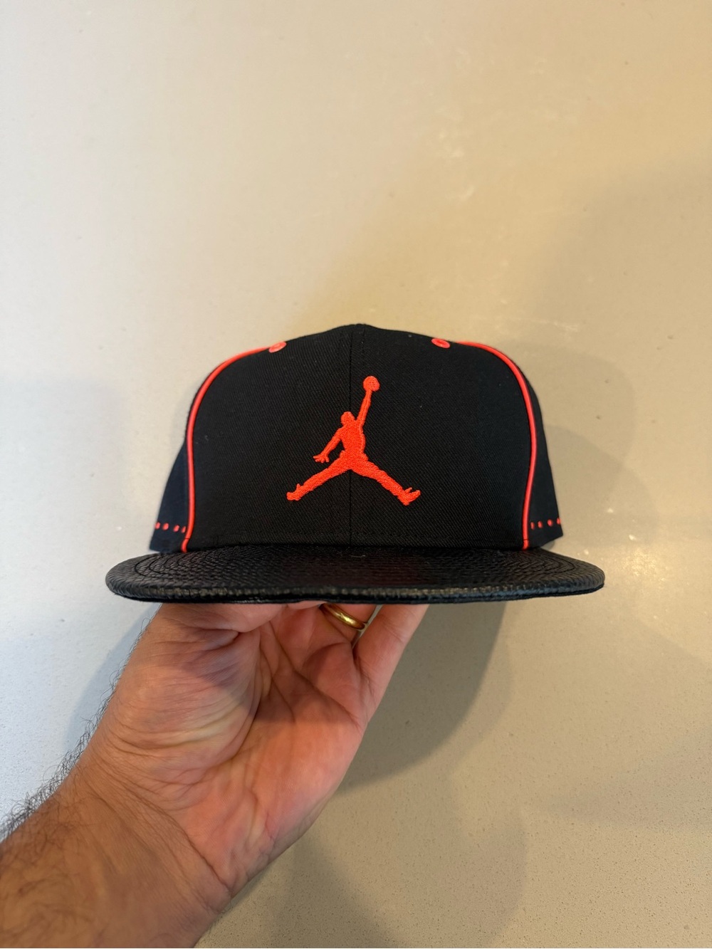 Jordan Black Snapback Hat with Red Jumpman